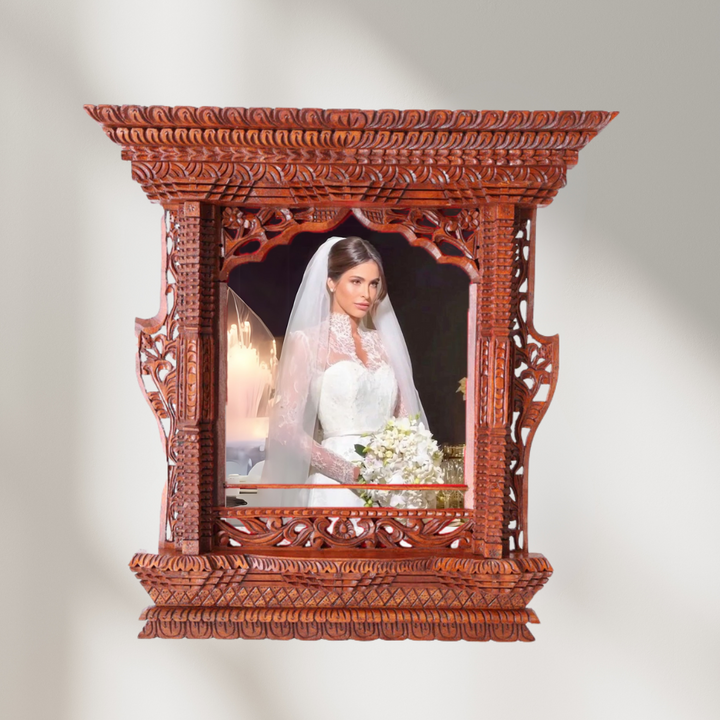 Intricately carved Royal Arch wooden frame displaying a close-up bride’s photo, highlighting beauty and heritage in wedding décor.