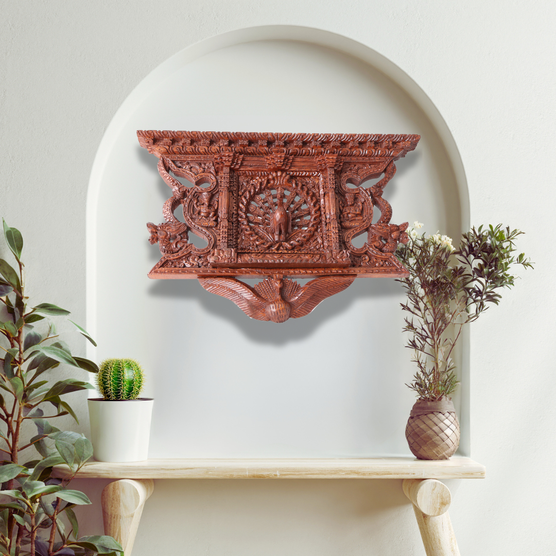 Elegant Peacock wooden carving displayed as part of cultural home décor, adding heritage and artistic depth to the space.