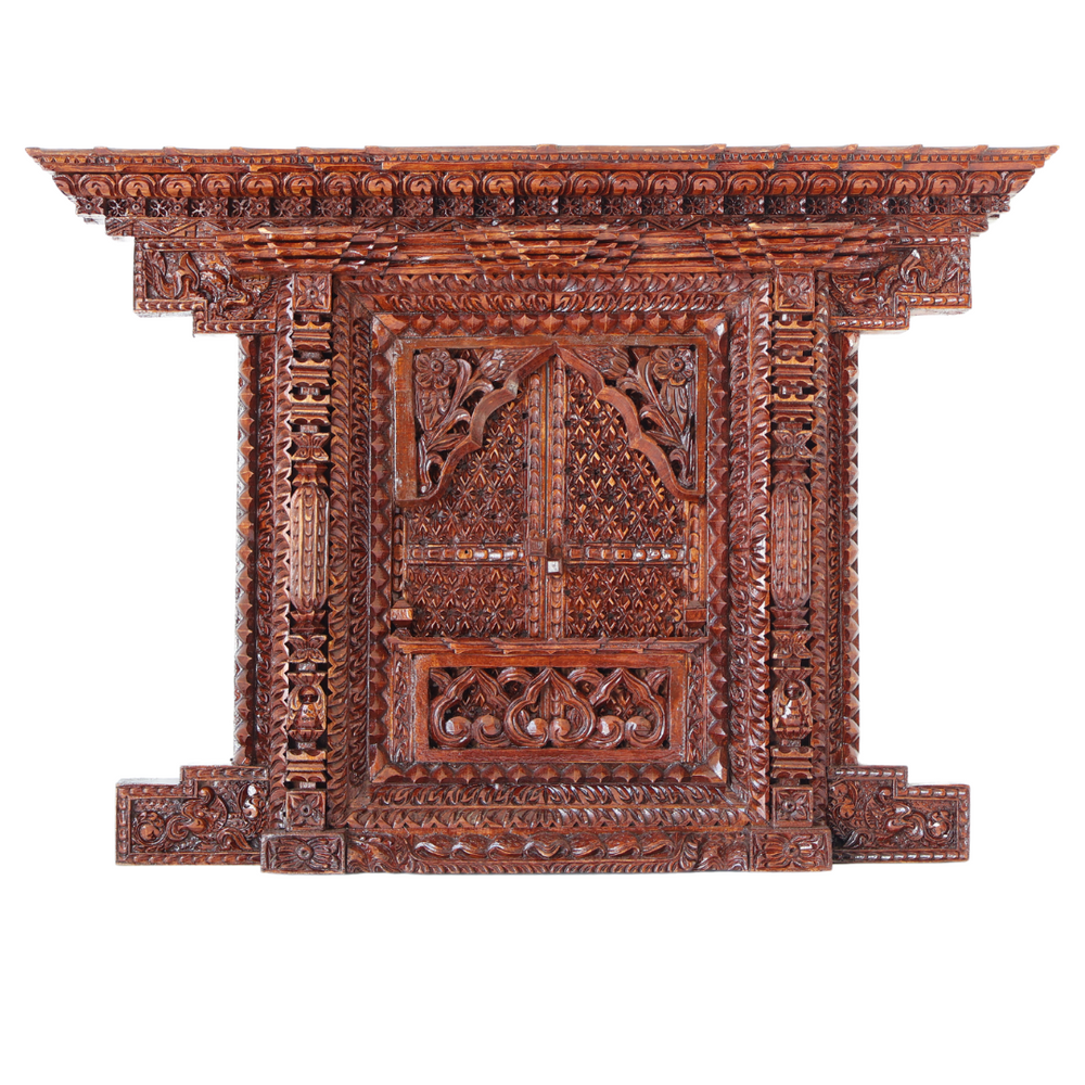 Traditional Nepalese Kumari Jhyal wooden frame with closed doors, intricately carved to resemble ancient temple windows