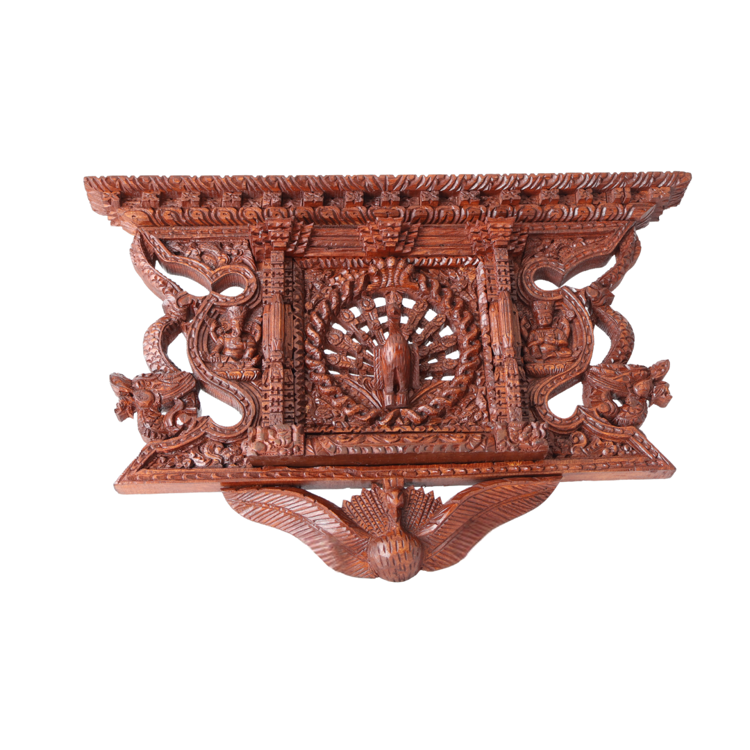 Handcrafted Nepalese Peacock wooden carving, featuring intricate detailing inspired by traditional temple architecture.