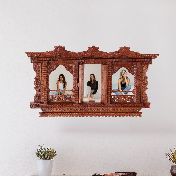 Intricately carved Sacred Window Trilogy wooden frame showcasing a portrait photo, highlighting Nepalese artistry and traditional craftsmanship.