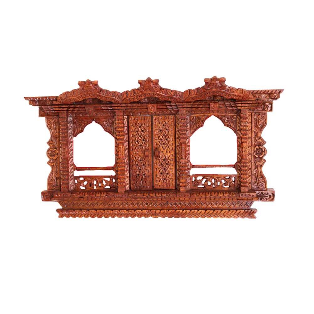 Traditional Nepalese Sacred Window Trilogy wooden frame with closed doors, intricately carved to resemble temple windows.