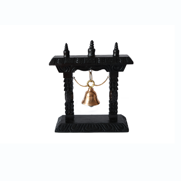 Timeless Artisan Hanging Bell with a brass chime and handcrafted wooden frame, inspired by Nepalese temple carvings.